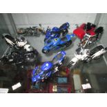 Shelf of Die cast toy motorbikes