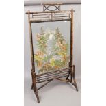 A Victorian Aesthetic Movement bamboo firescreen with pressed flower and butterfly collage panel.