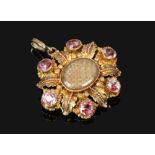 A Georgian gold canitelle pendant / brooch set with pink topaz.