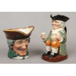 Two Royal Doulton character jugs; Dick Turpin and Happy John.