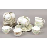 A Jason china six place tea set and a Noritake china part tea set.