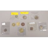 A collection of coins and tokens one possibly Roman, Queen Mary Tudor silver groat etc.