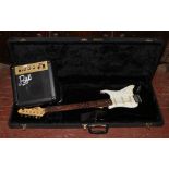 A cased Hohner Rockwood Stratocaster electric guitar, model 06X7 along with Park G10 MK11 practice