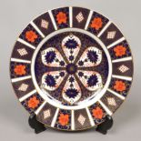 A Royal Crown Derby cabinet plate decorated in the Imari design, 10.5 inch.