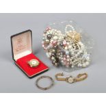 A quantity of costume jewellery including simulated pearls, brooch, ladies fob watch, necklet etc