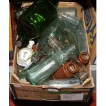 A box of bottles to include large liquor bottle, glass bottles with local makers etc.
