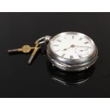 A silver pocket watch with Roman numeral markers and subsidiary dial, running assayed Birmingham