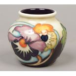 A small Moorcroft vase designed by Emma Bossons in the thoughts in flight pattern 7cm, first