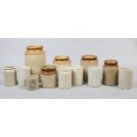 A collection of stoneware storage jars to include preserve examples.
