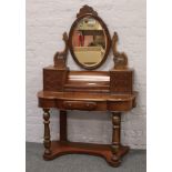 An early 20th century mahogany Duchess dressing table.Condition report intended as a guide only.