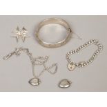 A collection of silver jewellery to include bangle, bracelet with heart shaped clasp etc.