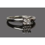 A 9ct white gold diamond 4 stone set ring, size N1/2.