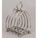 A silver four slice toast rack, assayed Birmingham by Charles S Green & Co Ltd total weight 130