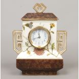 A Wedgwood Aesthetic movement mantel clock. With open fret twin handles, brown glazed borders and