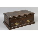An oak table top campaign chest with brass mounts 22 x 54.5 x 33.5cm.