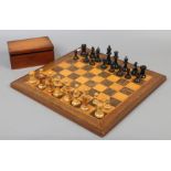 A chess board and boxed full carved wooden chess set of Staunton type, 2.7kg.Condition report