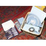 A small collection of Wedgwood, cutlery and commemorative beakers.