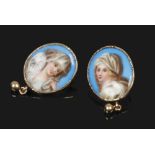 A pair of porcelain miniature set drop earrings with yellow metal mounts, depicting two females with