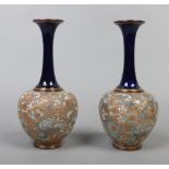 A pair of Doulton Lambeth Slaters patent mantel vases of baluster form with blue and gilt