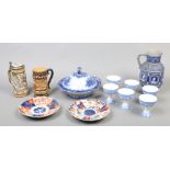 A collection of pottery and china to include Japanese Imari plates, Doulton blue and white tureen,