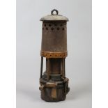 A late 19th century Davis-Derby dwarf deputy miners safety lamp stamped 21 with double gauze liner.