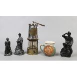 A collection of mining related items to include coal figurines, Eccles mining lamp, National coal