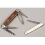 A George Wostenholm I. XL multi tool pocket knife with antler scales and a Joseph Rodgers folding