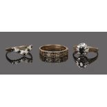 Three 9ct gold sapphire and diamond dress rings. Halo cluster O, wishbone Q, star set S.