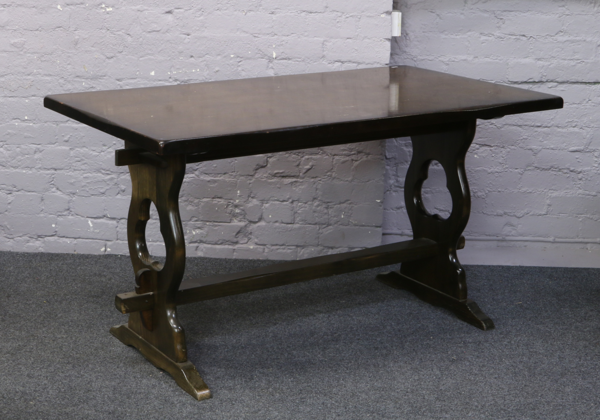 A carved refectory table.