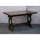 A carved refectory table.