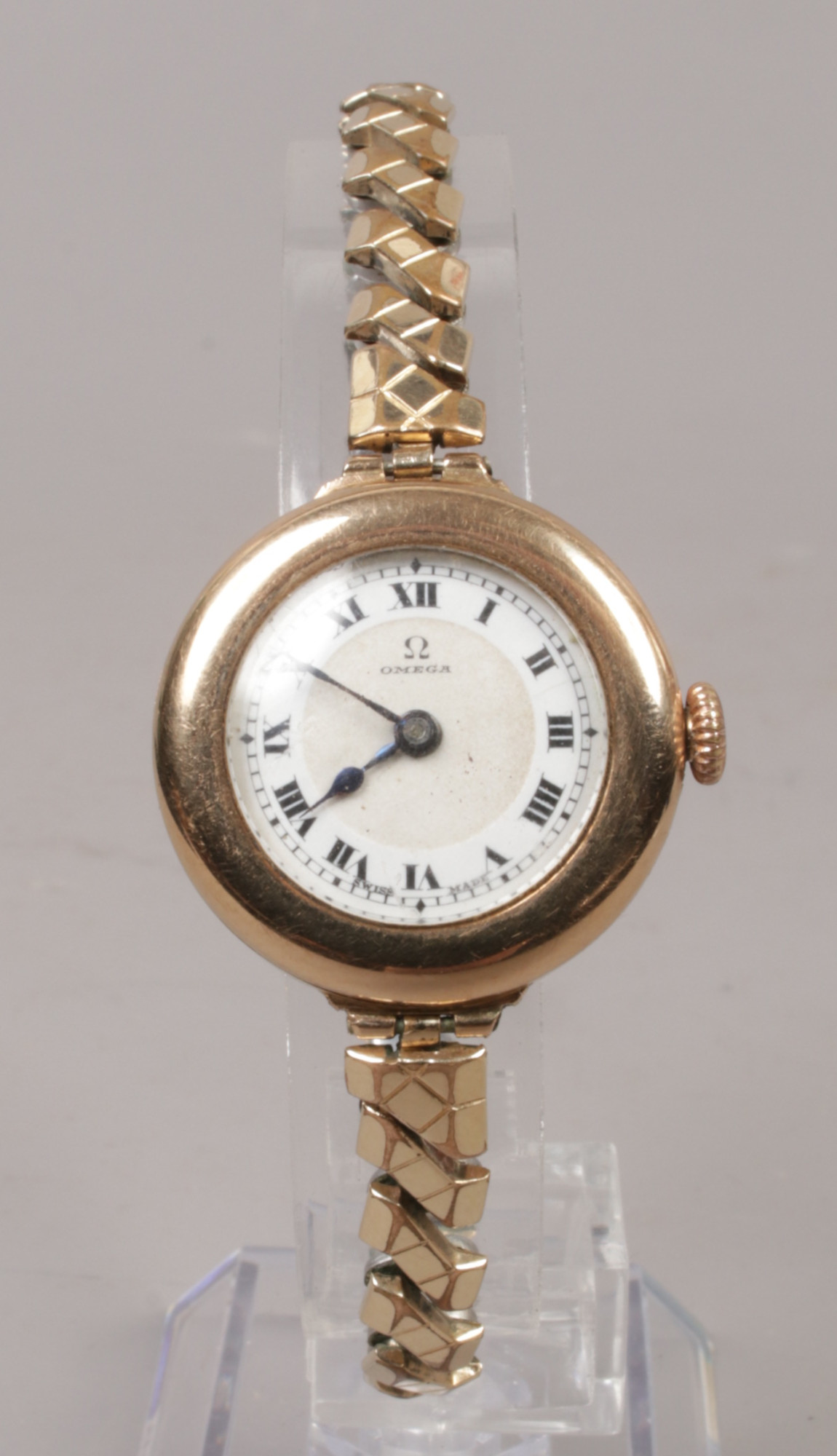 A 9ct gold cased bracelet watch (bracelet gold plated) with enamel dial having Roman numeral