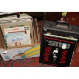 A box and a carry case of LP records to include Pink Floyd, John Lennon, pop, classical etc.