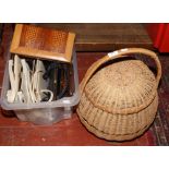 A quantity of ladies handbags and clutch bags including crocodile skin examples, along with a basket