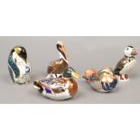 Five Royal Crown Derby bone china paperweights, all birds to include Pelican, Penguin, Puffin etc.