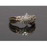 A 9ct gold and diamond cluster set ring, size M.