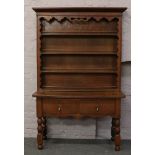 A Victorian oak dresser raised over turned supports, 198.5cm x 135cm.