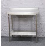 A stainless steel two tier food preparation / work station 90 x 60 x 94cm.