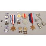 A trio of World War II medals including France and Germany star, war medal and 1939-1945 star, along