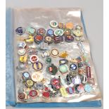 A folder of mostly vintage enamel pin badges including sporting, Rupert the Bear and military