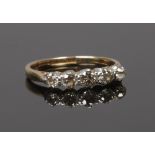 A mid 20th century five stone diamond ring marked 18ct and plat, size J1/2.