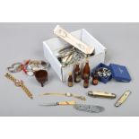A box of collectables including miniature glass advertising bottles, a ladies regent 9ct gold back