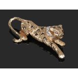 A 9ct gold sapphire, diamond and ruby brooch in the form of a leopard wearing a white metal
