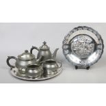 A four piece Liberty & Co. Tudric pewter tea/coffee set on circular Atkin Bros silver plated tray,