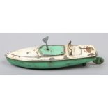 A vintage Hornby tin plate clockwork 'Hawk' speedboat.