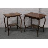 Two mahogany scalloped edge two tier occasional tables.
