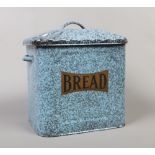 A twin handle enamel bread bin.