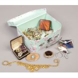 A floral jewellery box and contents of costume jewellery mainly coloured paste brooches and