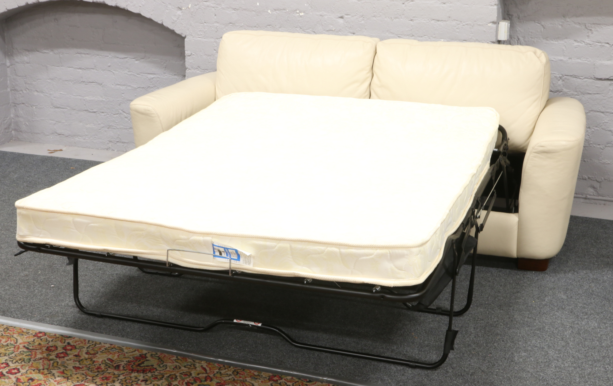 A cream leather three seat sofa bed. - Image 2 of 2