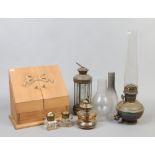 A mixed group to include pine desk tidy, glass ink wells, oil lamps etc.