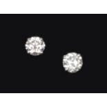 A pair of 18ct white gold diamond stud earrings, total diamond weight 0.38 carat.
